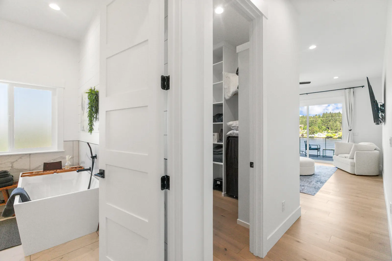 Walk-in closet in the primary suite at Luxe Port Lookout