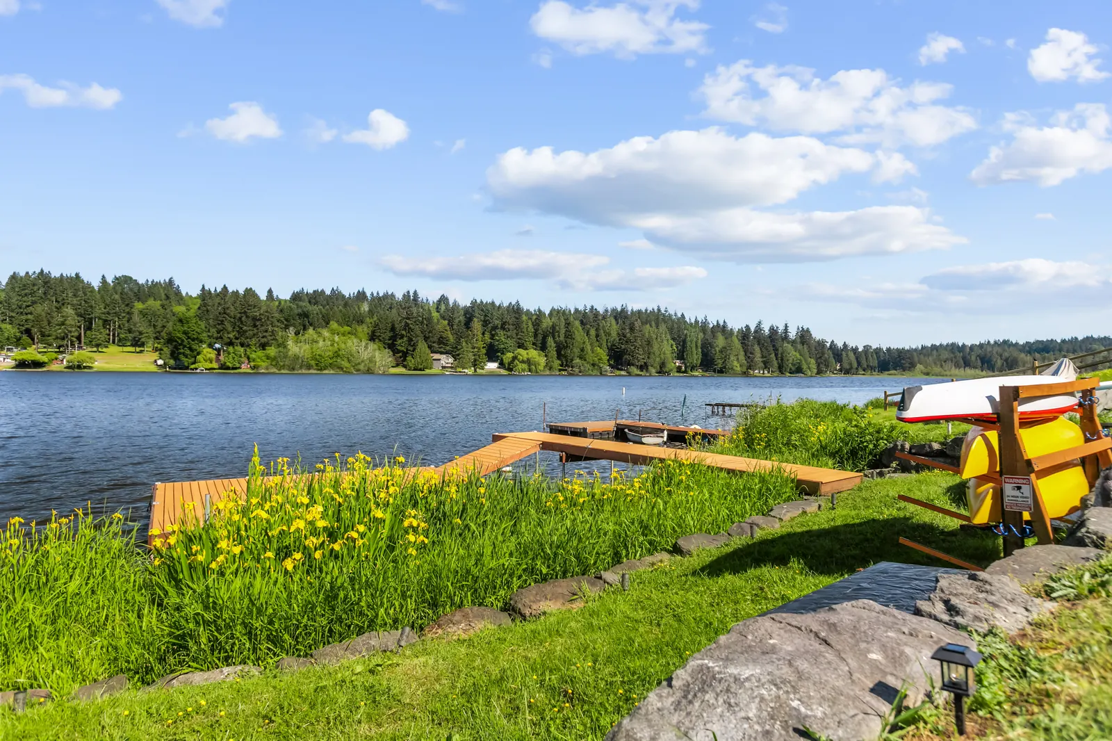 Private dock and kayak rack at Luxe Port Lookout