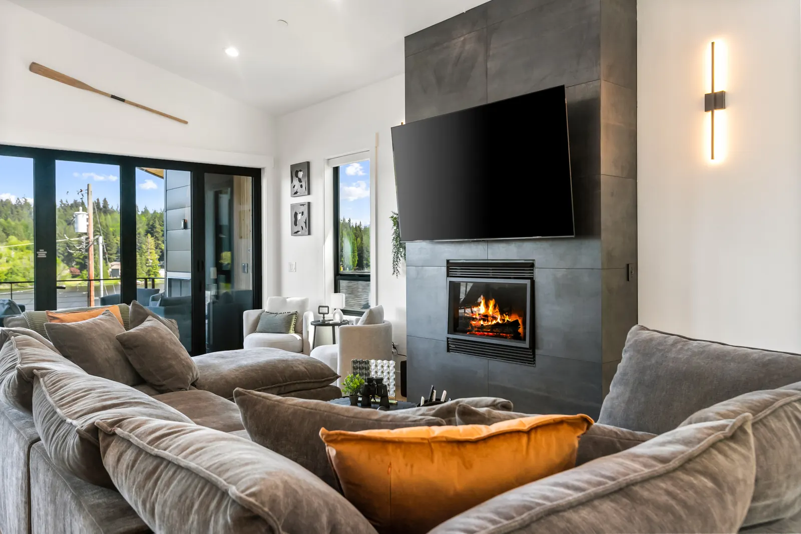 Living room with gas fireplace at Luxe Port Lookout