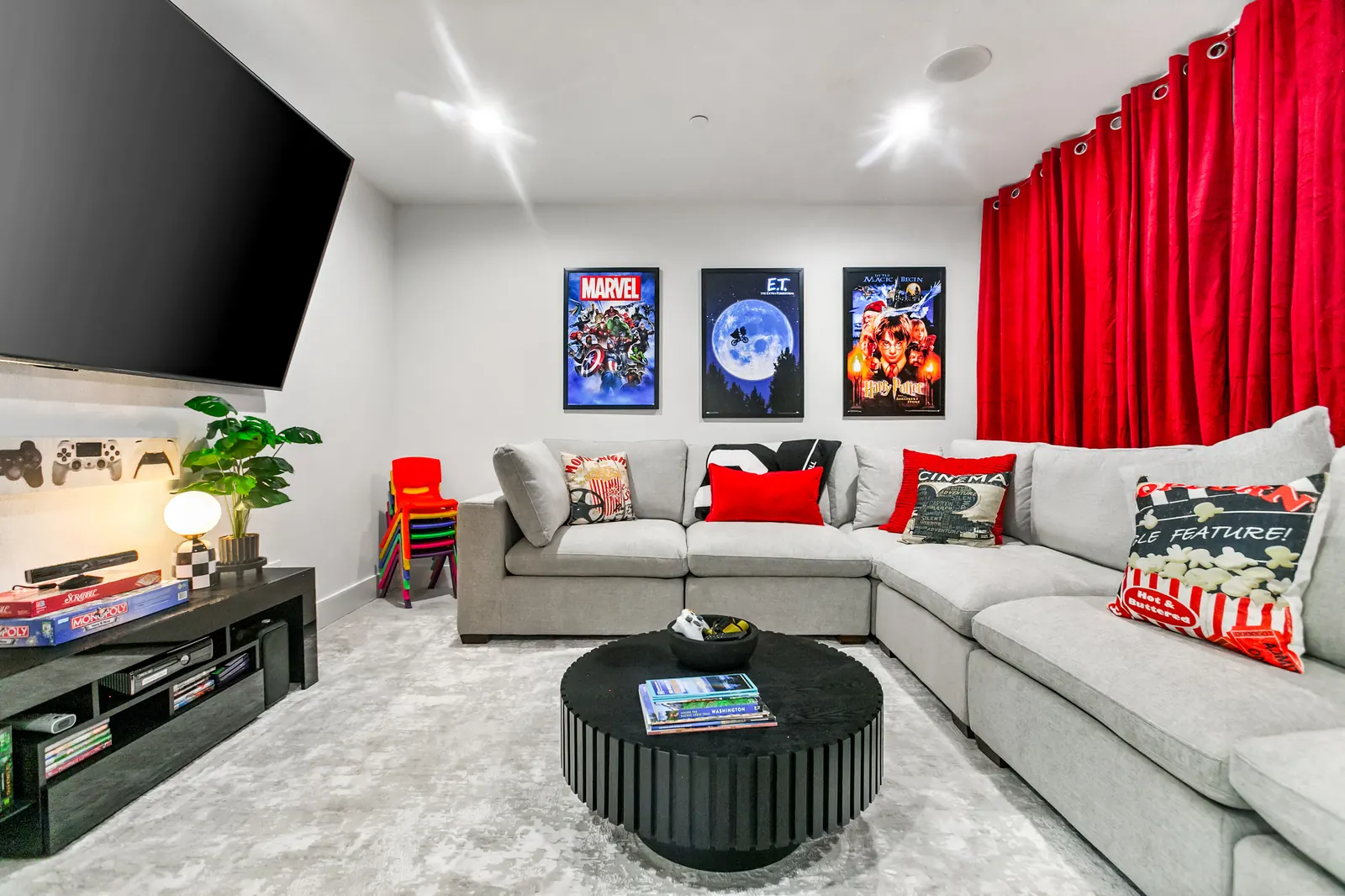 Red Room home theater with sectional seating at Luxe Port Lookout